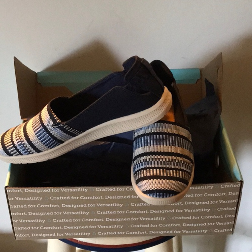 Never worn!  New in box!  Navy blue slip on sneaker style shoes by Baretraps. !